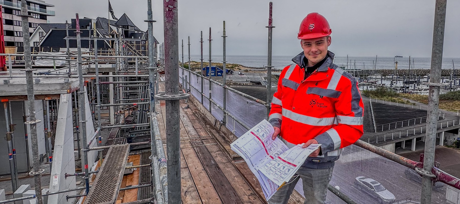 Bouwen op een postzegel aan zee