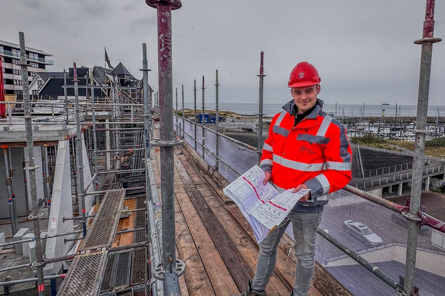 Bouwen op een postzegel aan zee